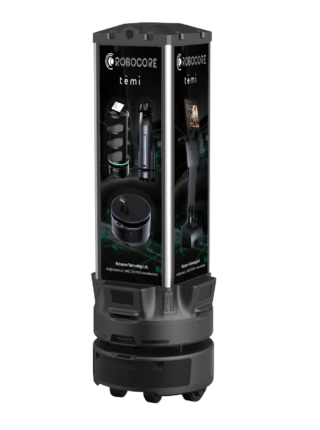 Promotional display stand for Robocore Temi accessories, showing a cordless vacuum, charging dock, and related components on a circular base at a black finish.